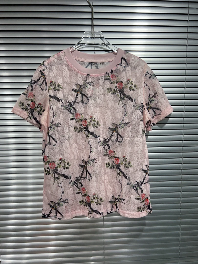 深圳MMOUHUO新款花花透上衣