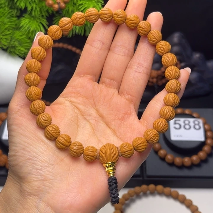 林***吊坠桃核小金豆1.0