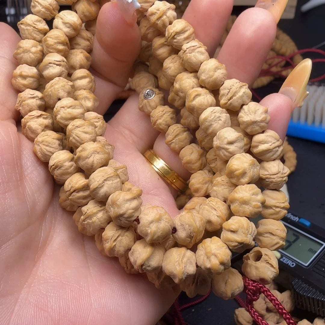 ****雾吊坠柏香籽/百香籽醒狮