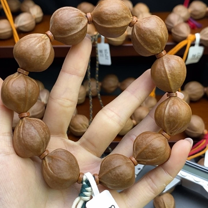 橙***儿橄榄核吊坠1111111