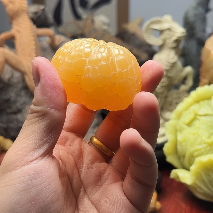 辽宁石橘子手把件