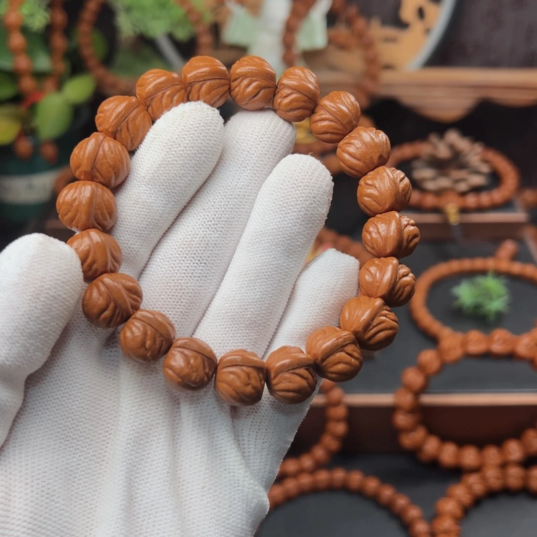 吊坠桃核1.4光头强手串