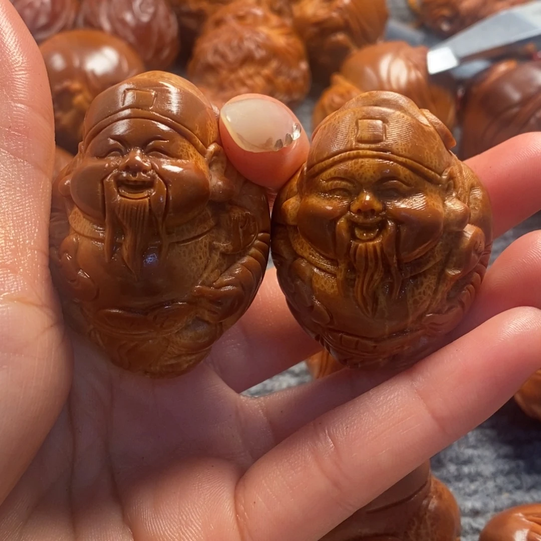 友***哥橄榄核吊坠一对财神
