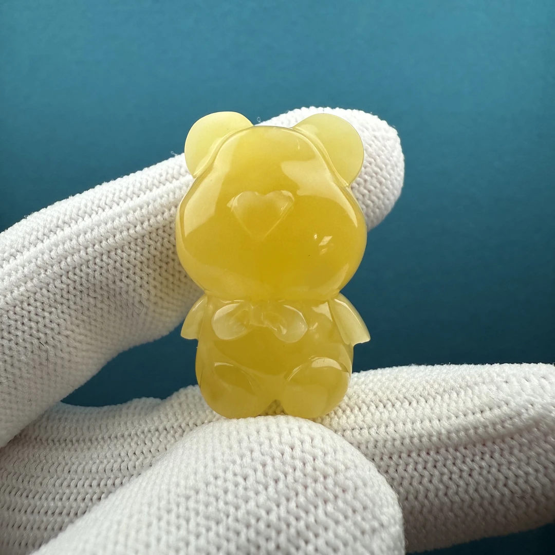 Y5806天然原矿蜜蜡 小熊牛鼻孔18*29*14mm 一图一物假一罚十