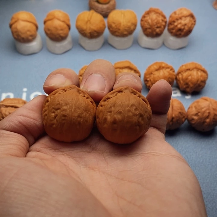 文玩核桃把件光头元宝