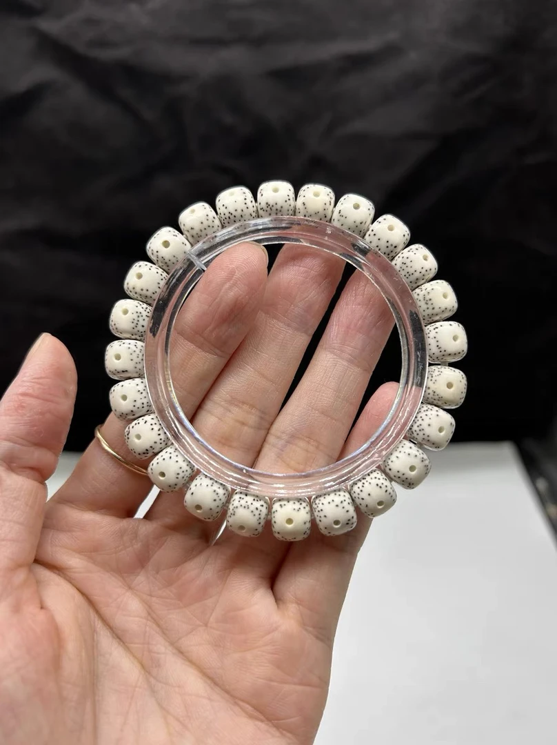 超福利精品海南干磨顺白星月菩提9X10正月桶珠双留白