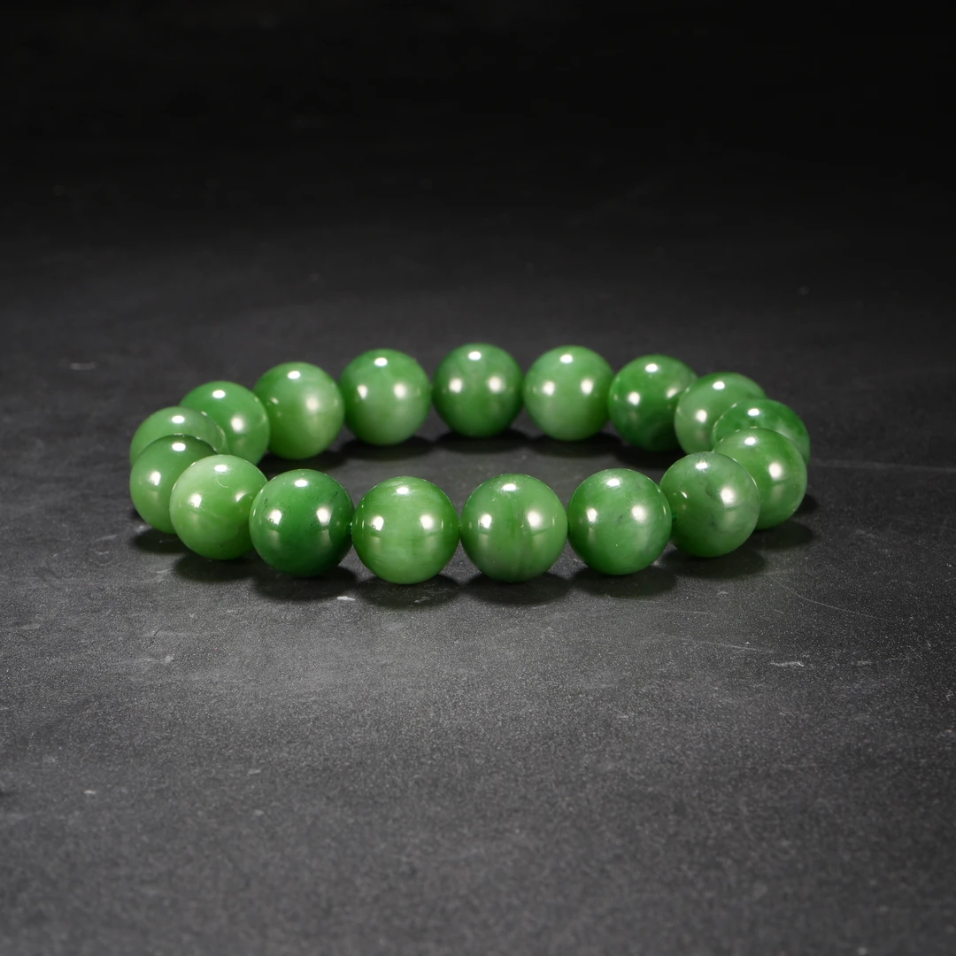 lot8精品和田碧玉猫眼珠串/保利拍卖