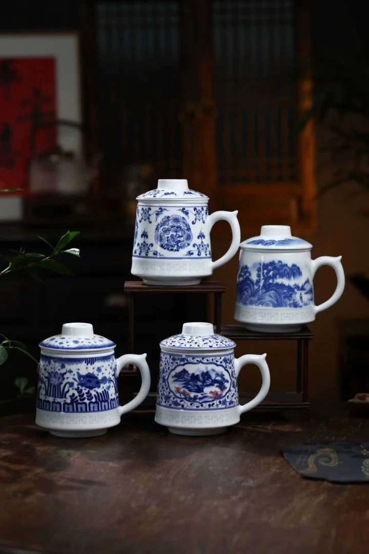 景德镇本土高白瓷青花釉下彩玲珑茶水过滤杯带盖办公杯家用马克杯