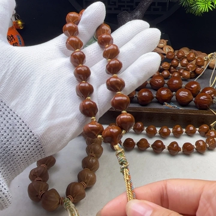 勇***前手串/手链橄榄核1.3*1.3去霜蜜桃臀铁核