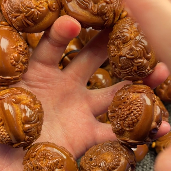 橄榄核吊坠靓**生橄榄核手持