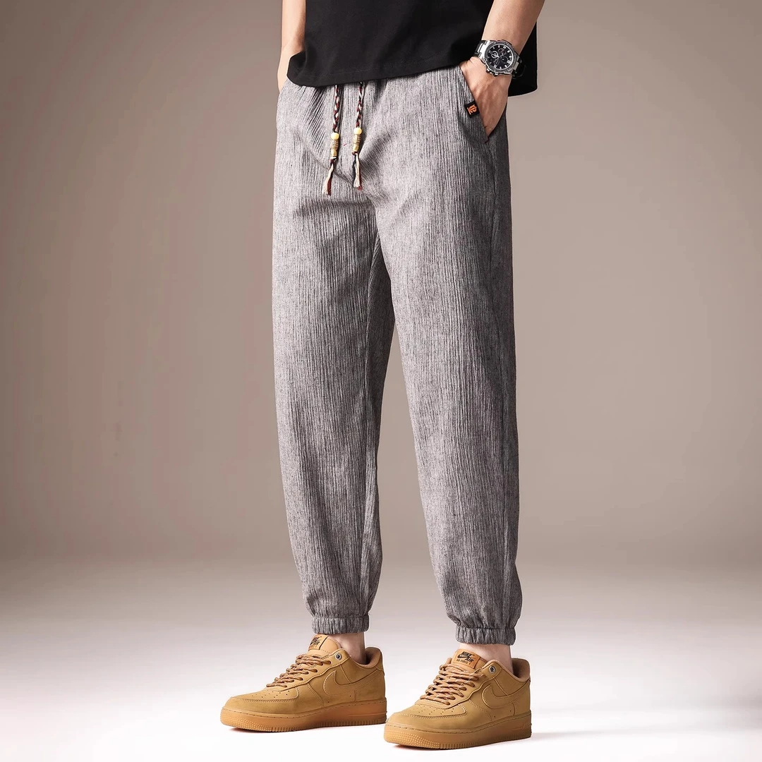 高端亚麻透气休闲裤子男夏季冰丝薄款九分束脚潮流哈伦宽松运动裤