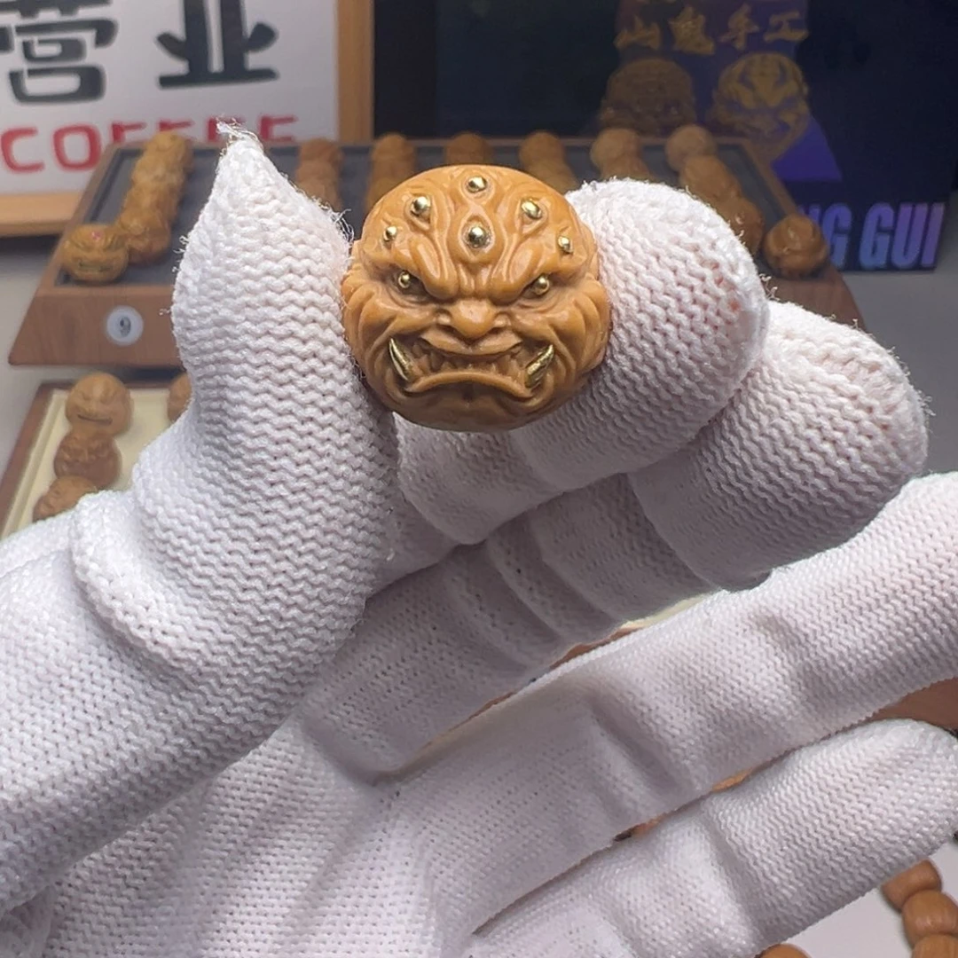 文玩核桃把件镶嵌款九目獠牙18左右尺寸全品有正常封口线