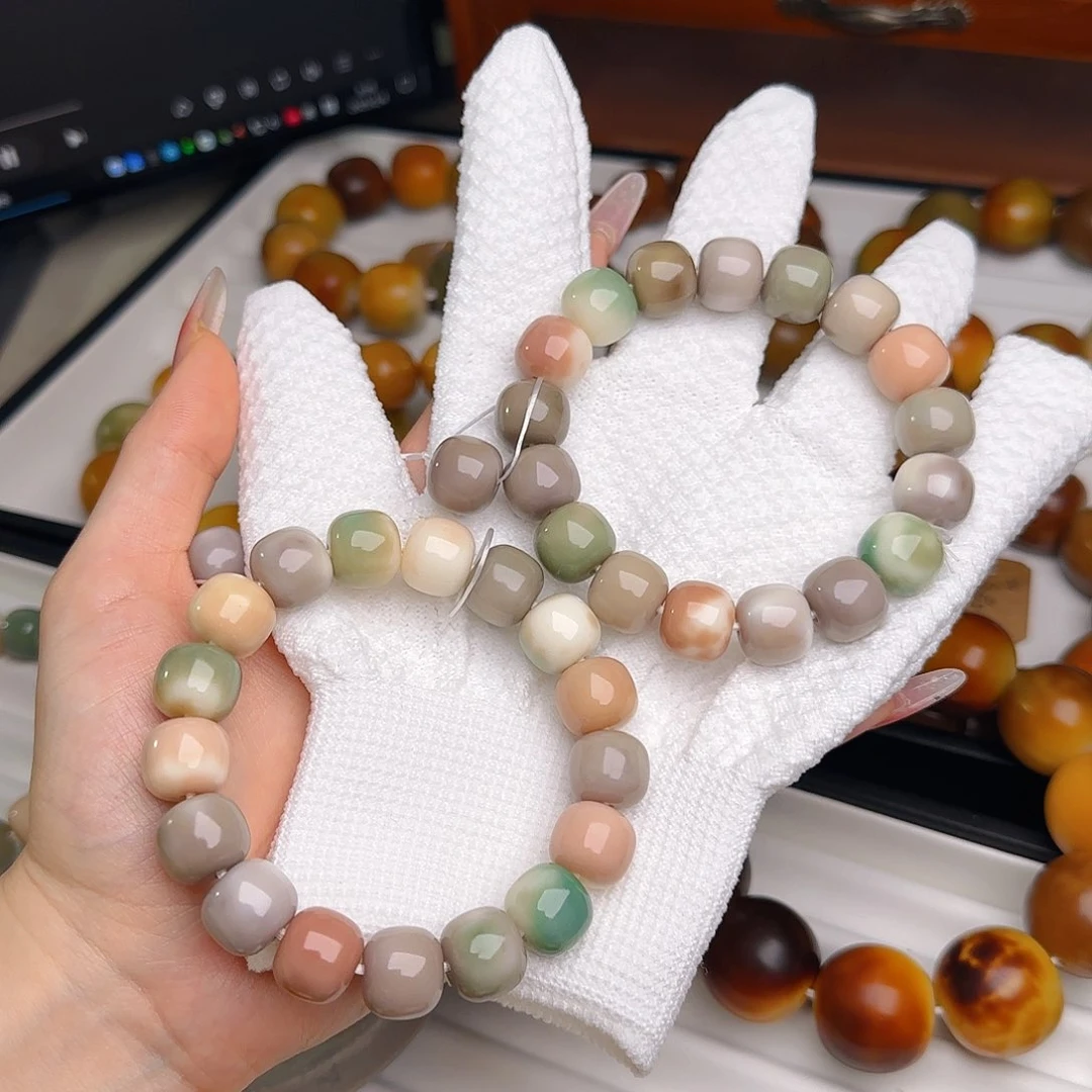 菩提根/象牙果手串M****u卡13水磨飘花微瑕不退