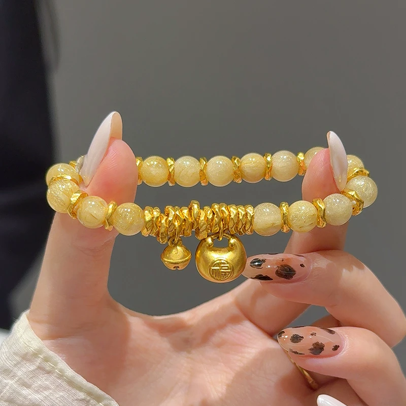 海上罗孚黄金小胖福铃铛盘缠金发晶手串999足金天然手链送女友