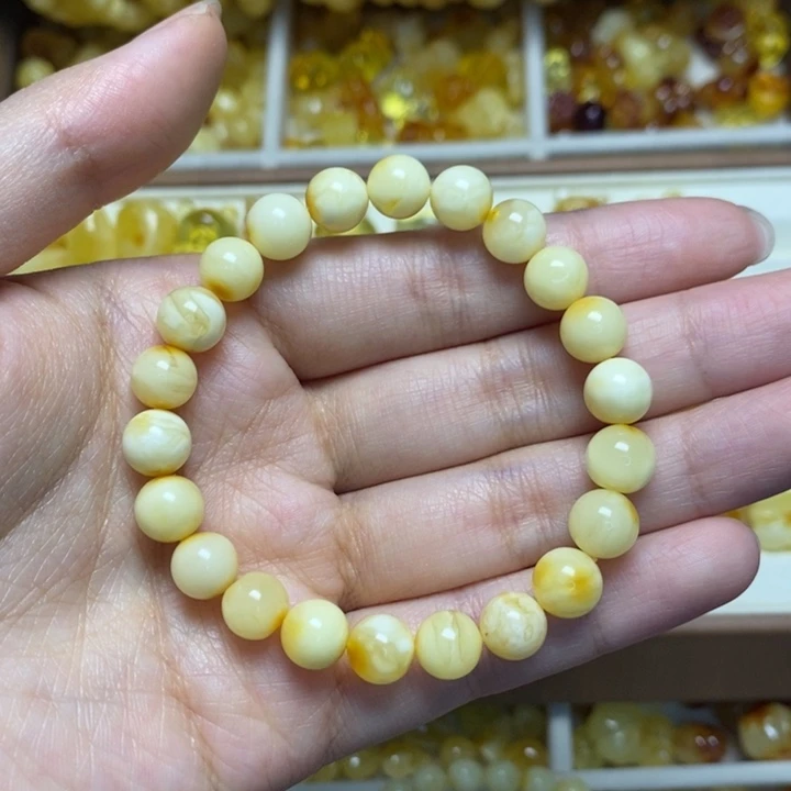 琥珀未镶嵌裸石白花圆珠手串