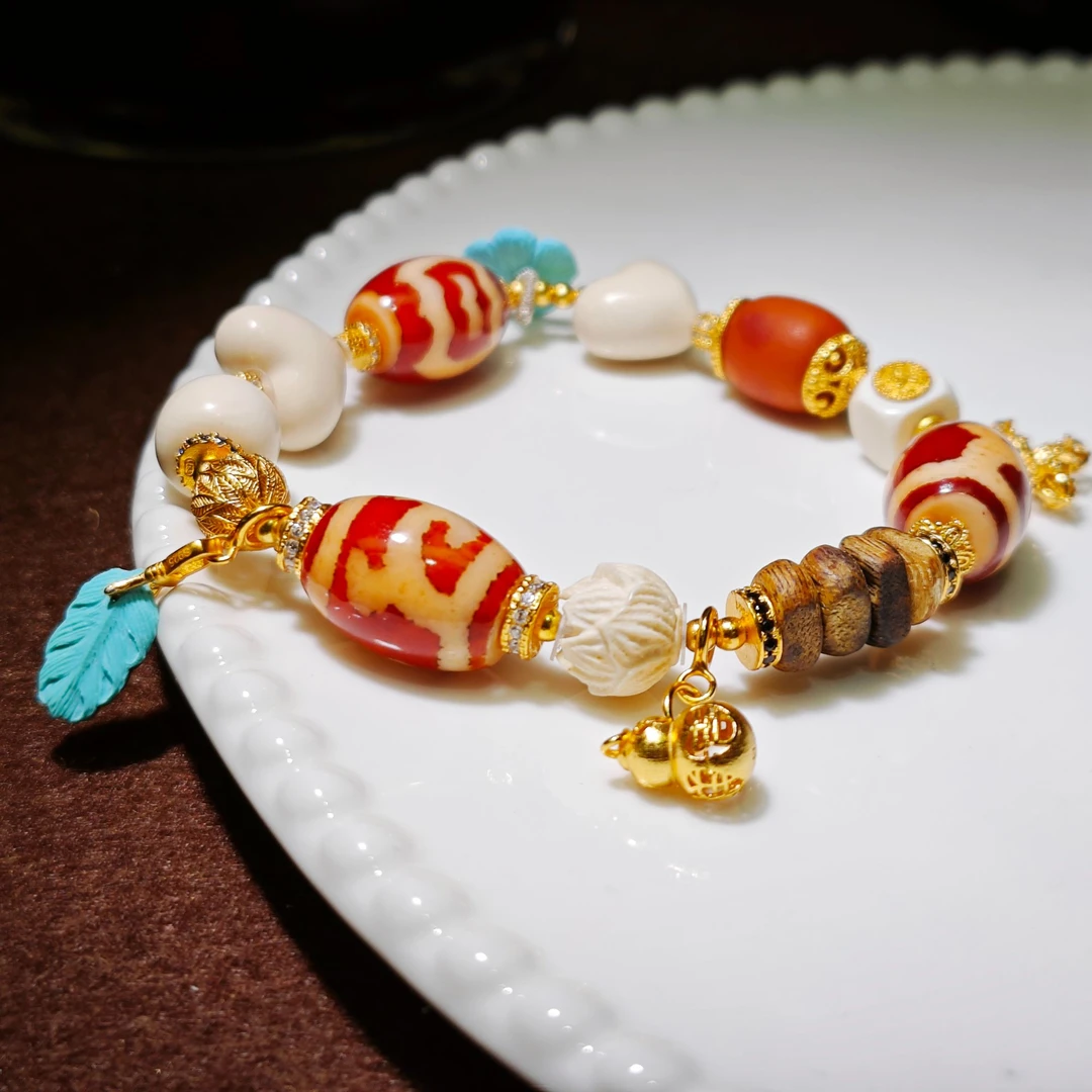 猛犸牙多宝原创设计新年款手链百搭手工甜美