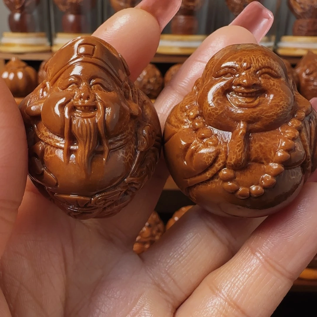 橄榄核把件高*财弥手把件37