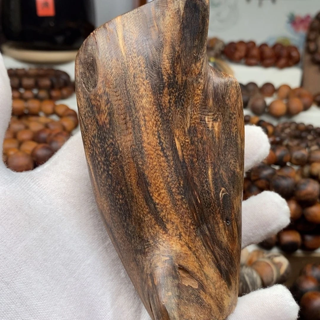 贡木原木龙鳞手把件