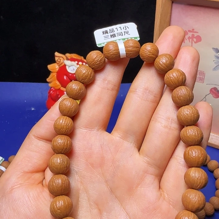 J***吊坠猴头核桃凤羽