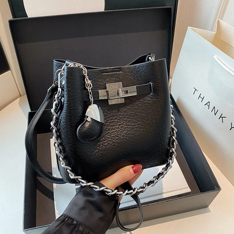 重工编织链条手提包包2025新款时尚轻奢软皮铂金包单肩斜挎水桶包