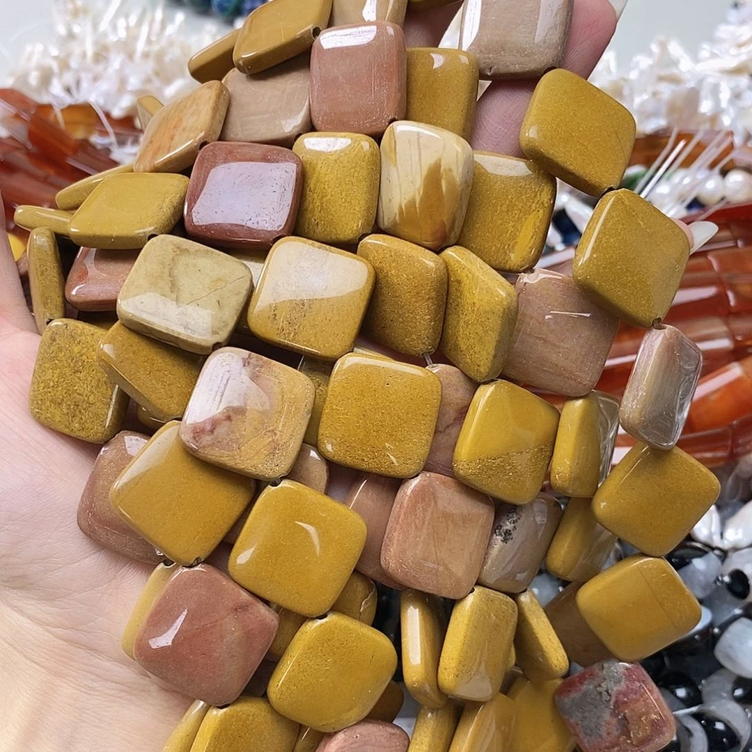 玛瑙/玉髓未镶嵌珠宝半成品蛋黄石对角一条