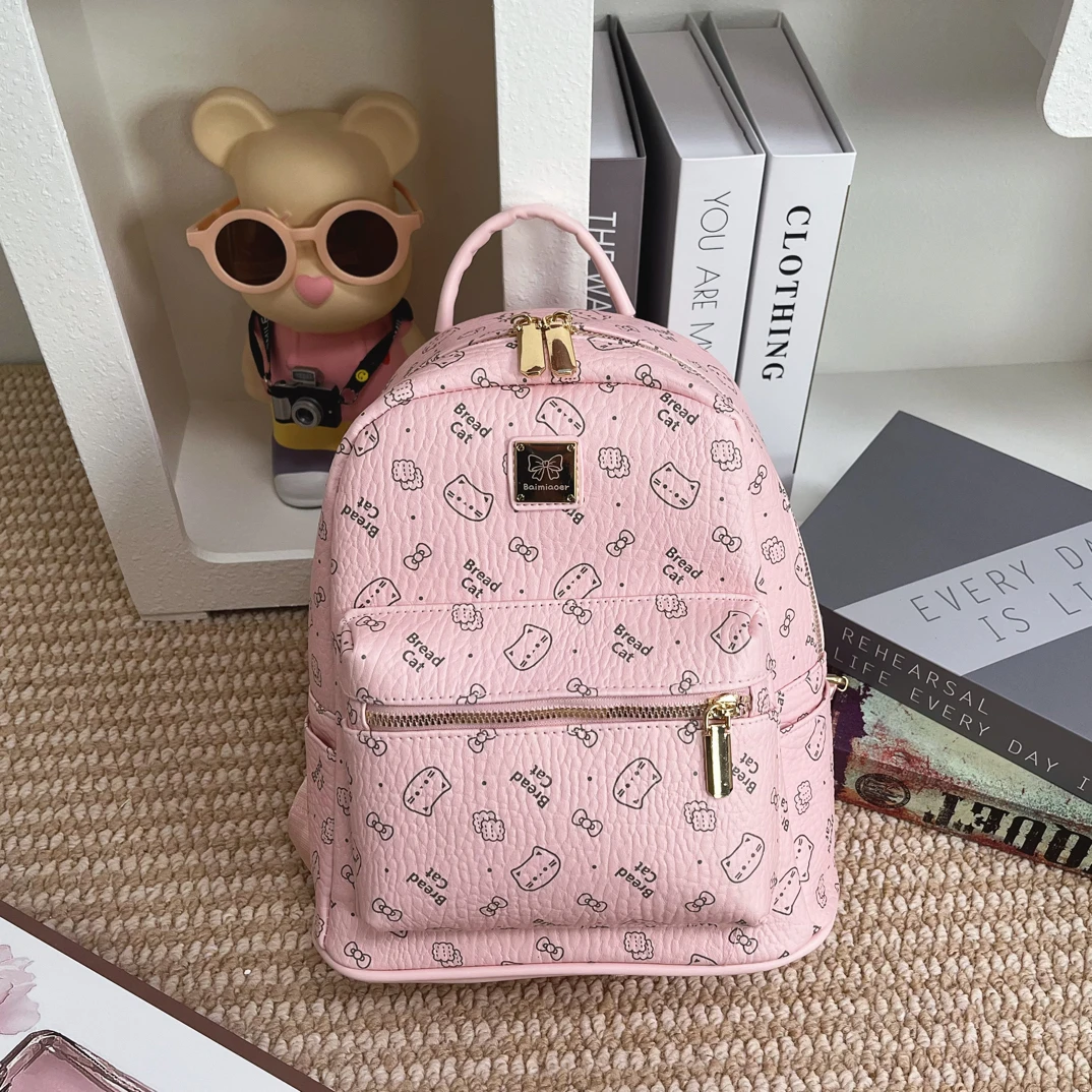 2025新款猫咪印花粉色早秋出游双肩包时尚便携多功能大容量包包女