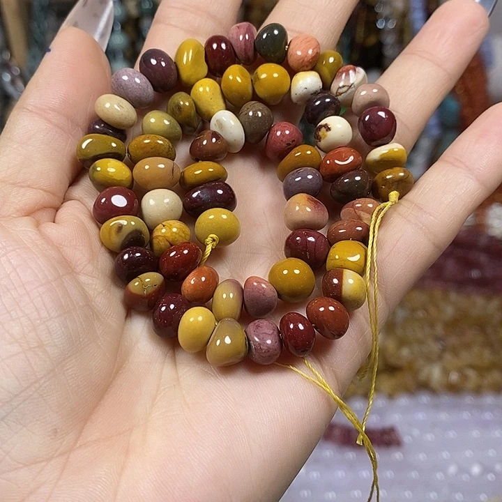 玛瑙/玉髓未镶嵌珠宝半成品天然蛋黄石糖豆一条