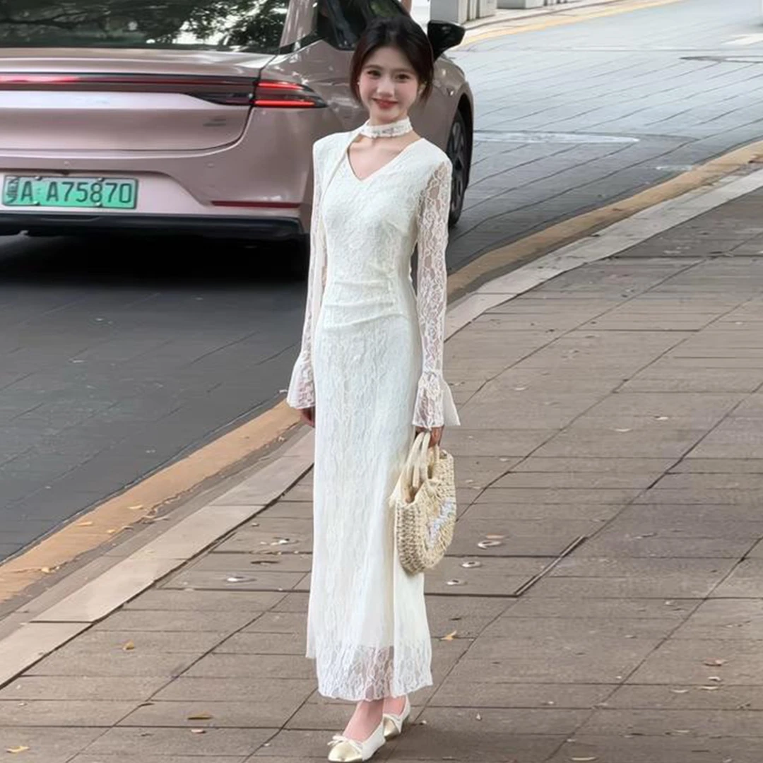 法式温柔风白色蕾丝长袖连衣裙子女早秋季2025新款掐腰显瘦长裙