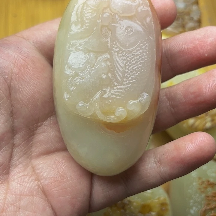 太*人石材方解石手把件