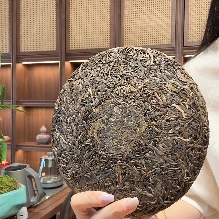 贺松头春生茶 357g