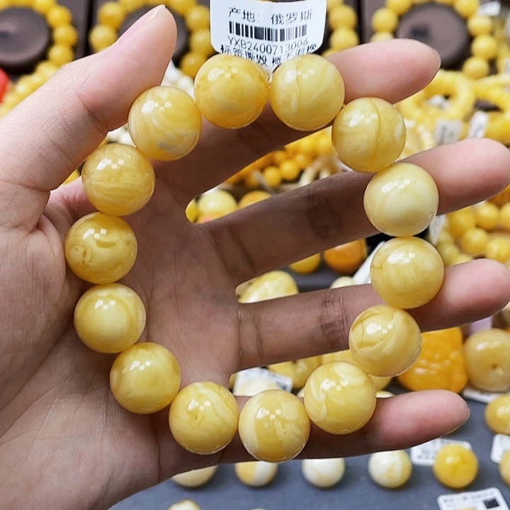 未镶嵌琥珀珠宝奇石?***?15+mm黄白妖花 微瑕