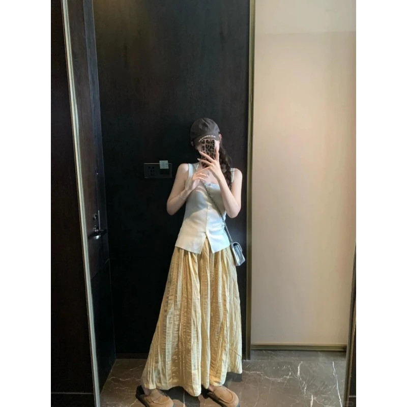 时尚小众设计款显瘦修身无袖穿搭上衣2025夏季气质收腰A字半身裙