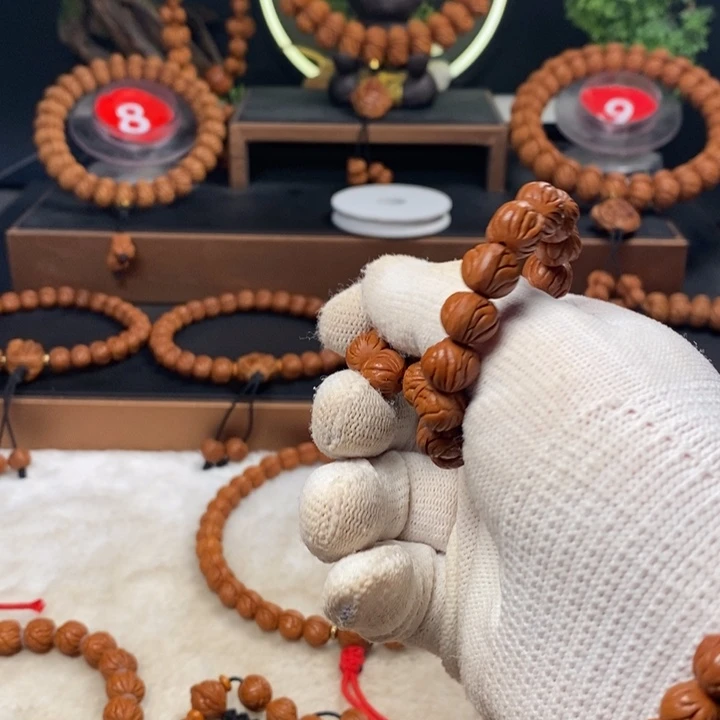 桃核吊坠口***?秦岭龙纹桃核