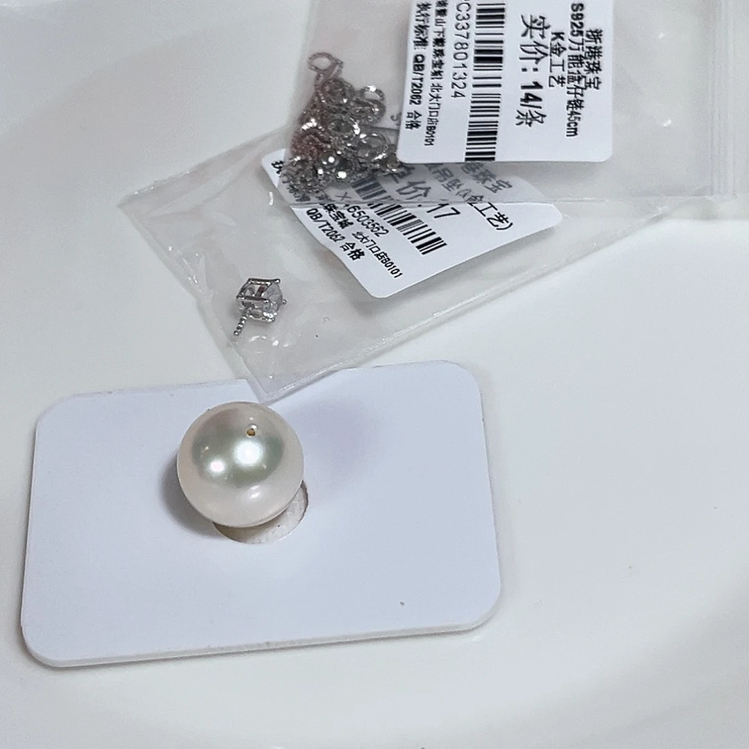 暖****淡水珍珠银S925镶嵌颈饰