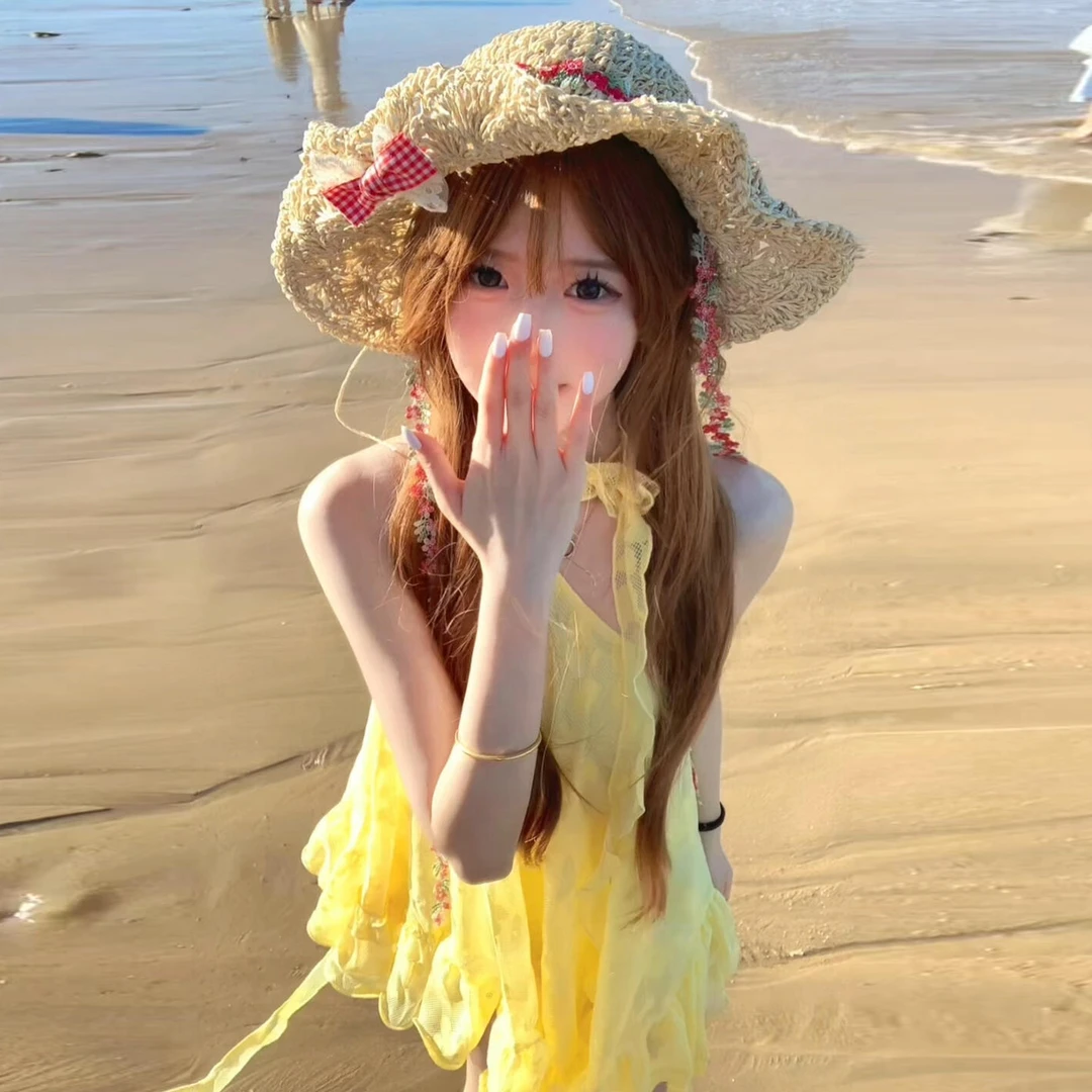 小个子法式黄色斜肩吊带连衣裙子女夏季2025新款海边度假蓬蓬短裙