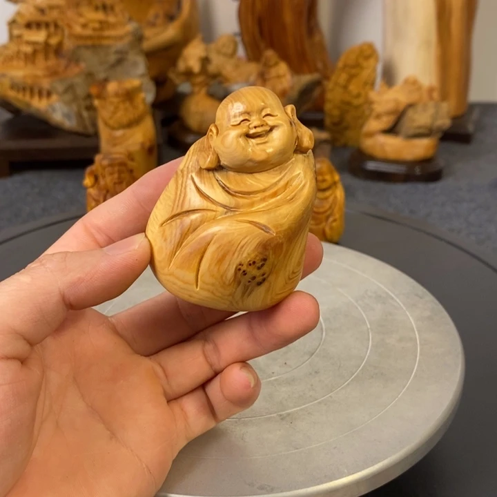 柏木（崖柏）弥勒佛留疤手把件