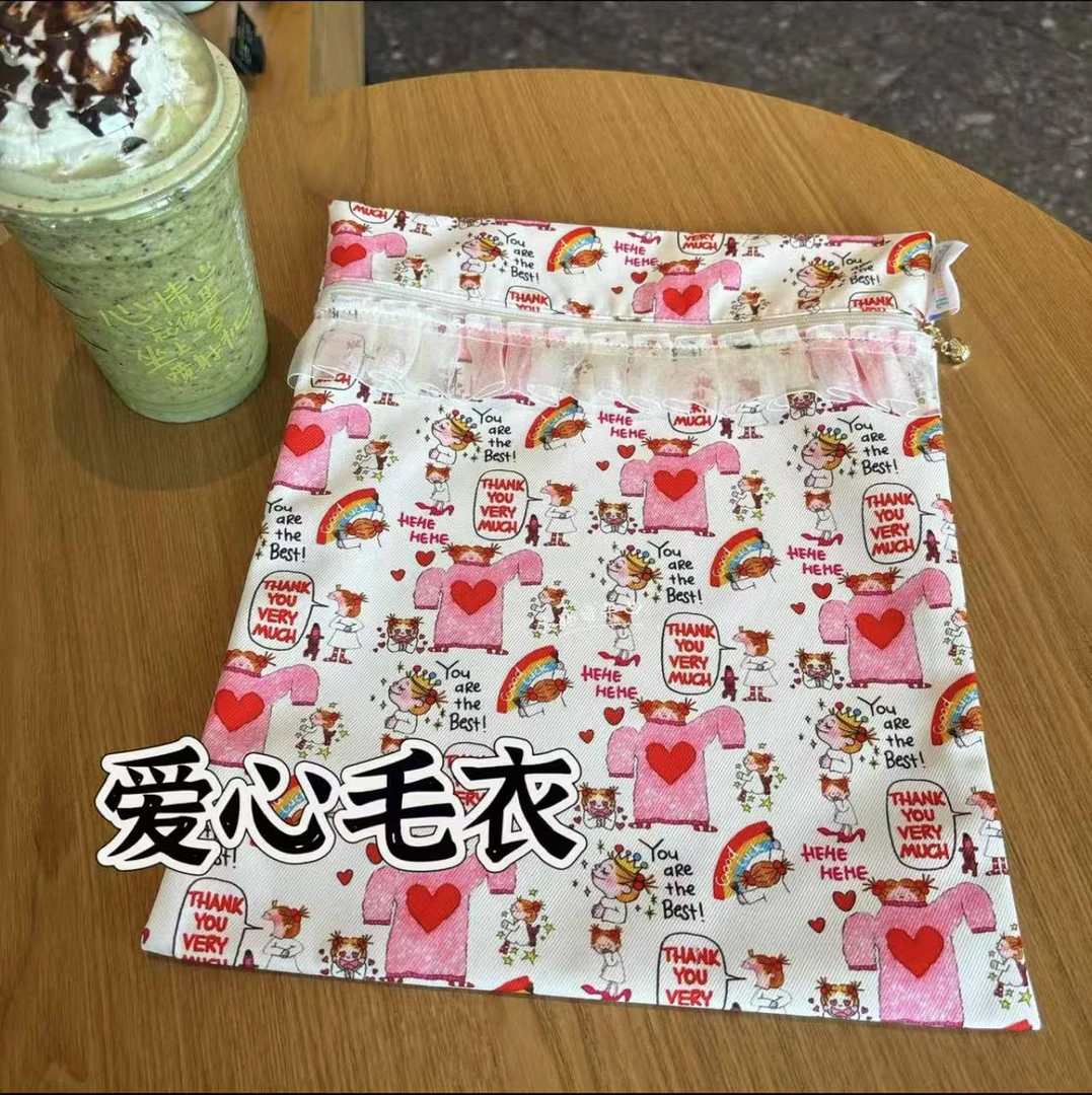 M930 新款可爱COCO小女孩印花布艺爱心毛衣