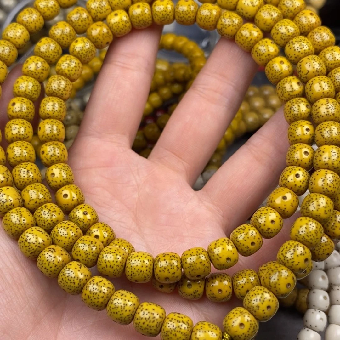 星月菩提吊坠7x8鸡油黄108