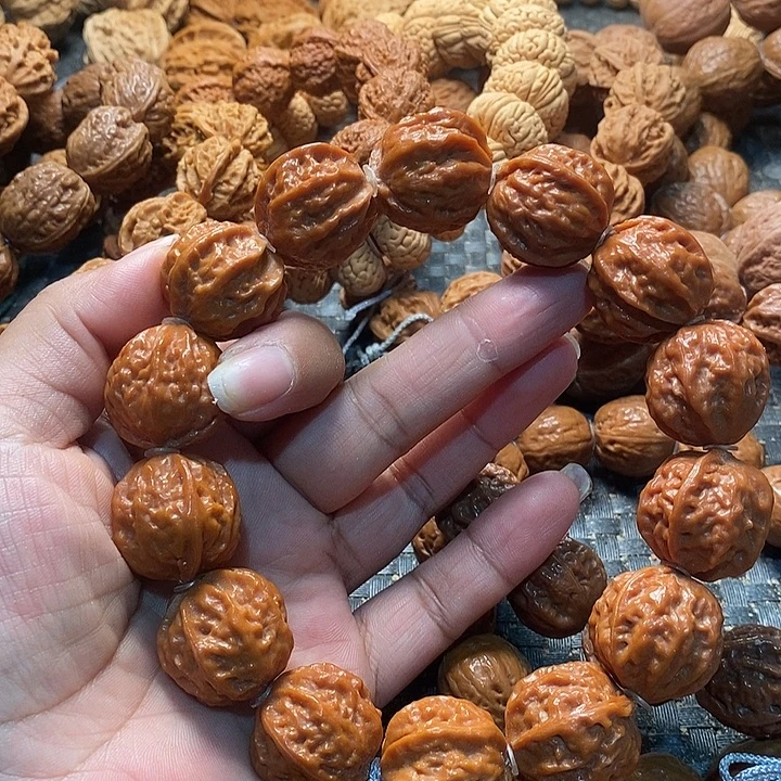 .***V文玩核桃手串树王京八棱