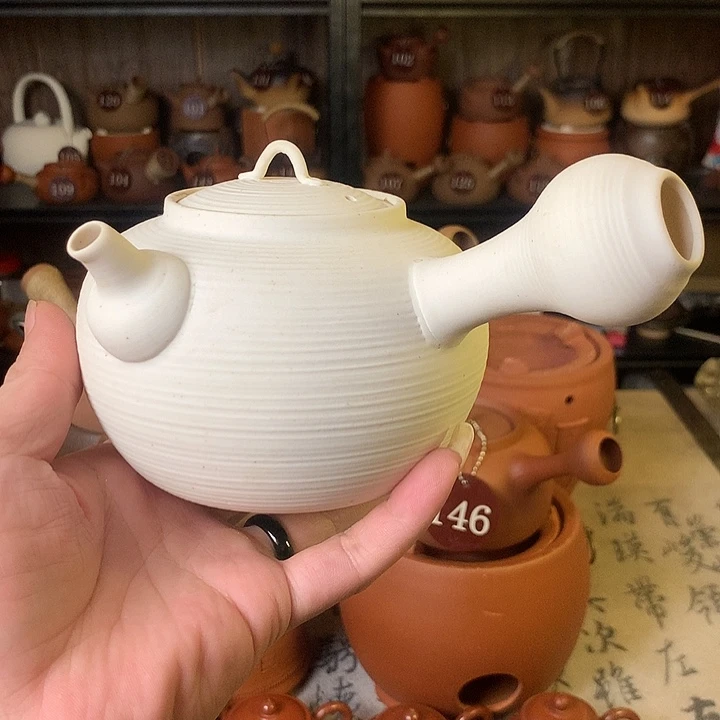 梅姐，玛瑙砂铫壶。