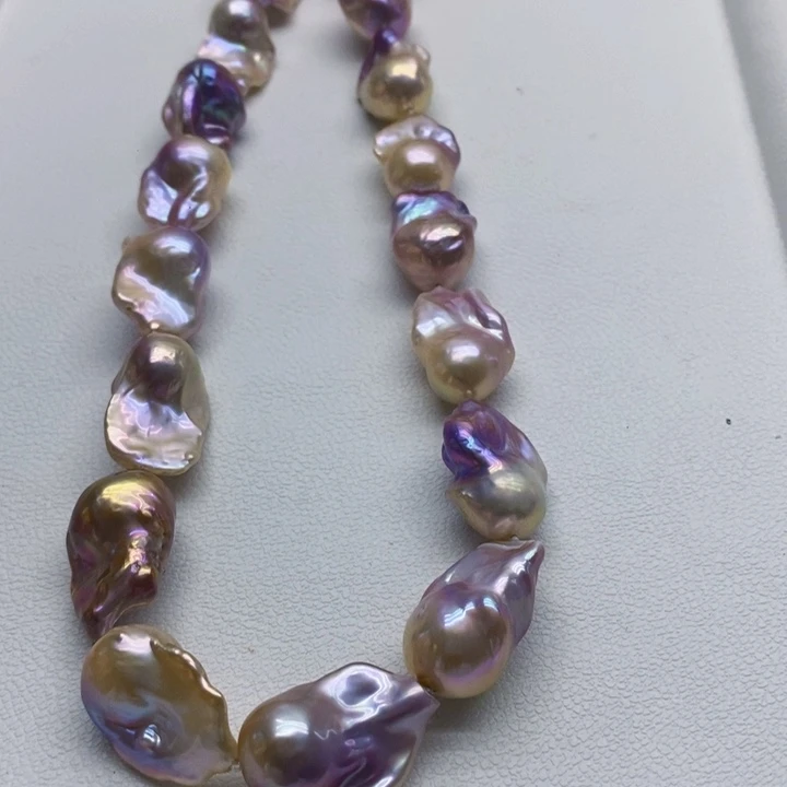 银S925镶嵌淡水珍珠耳饰S****’