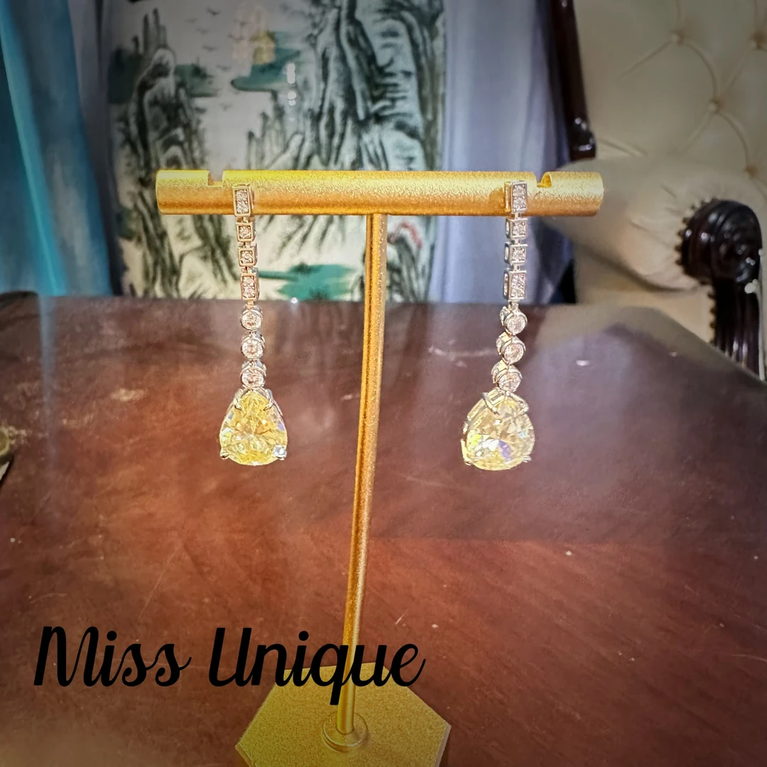 S6240鹅黄流苏水滴耳环