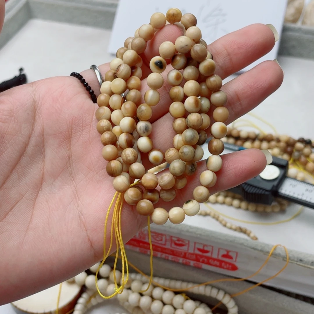 吊坠柏香籽/百香籽猛犸牙特价脖挂