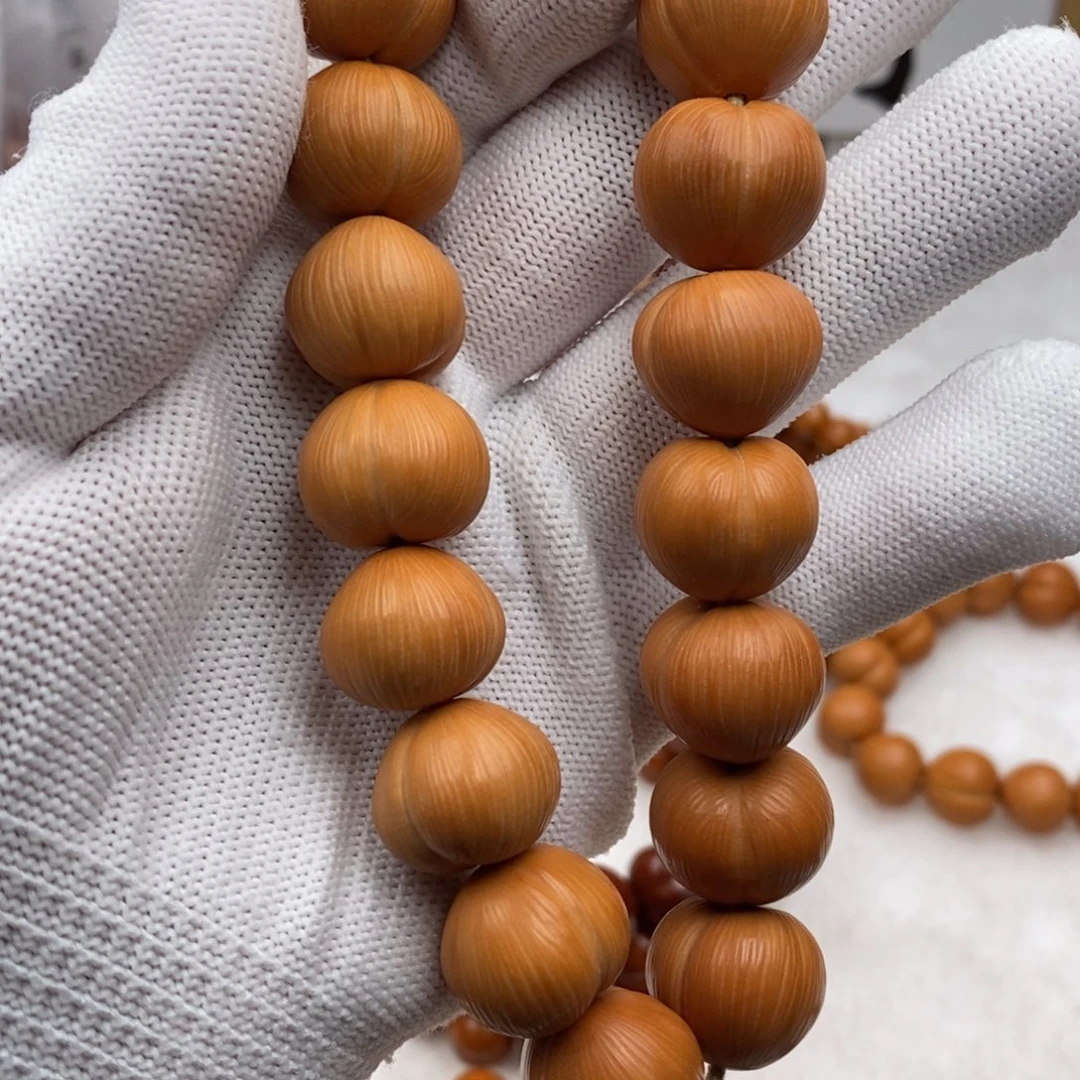 仲****猴头核桃手串屁桃