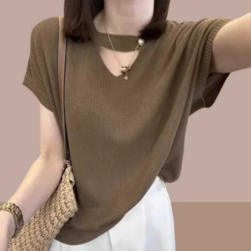 慵懒风冰丝短袖针织衫女士2025夏季新款欧货宽松别致镂空薄款上衣