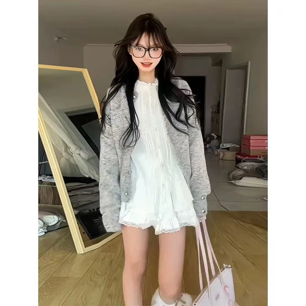 早春一整套女装2025新款韩版通勤百搭针织开衫花边白色短裙两件套