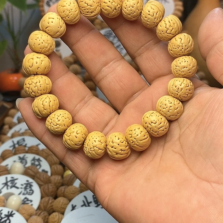 【闪购商品】温**良桃核手串纽扣手串