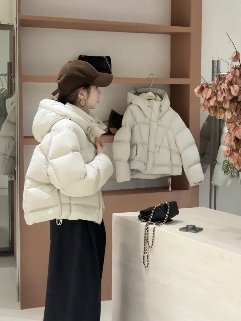 韩系高级感泡芙连帽羽绒服女2025冬季爆款时尚保暖显瘦面包服上衣