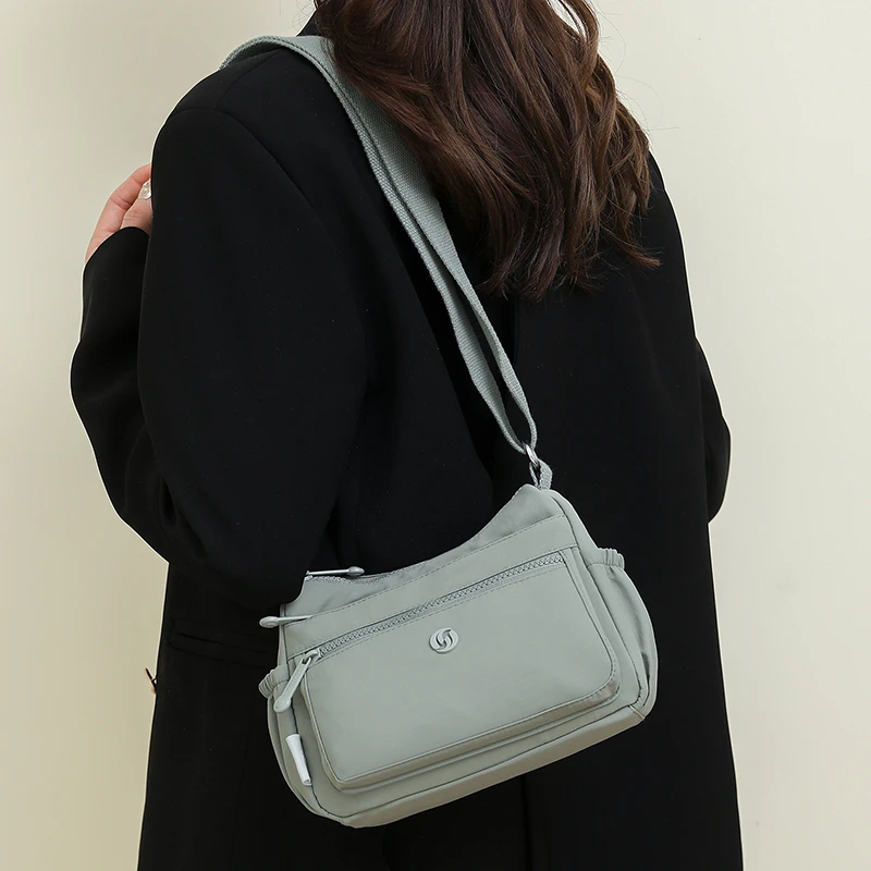 003新款马卡龙色尼龙小方包防水轻便帆布包包休闲单肩斜挎手机包