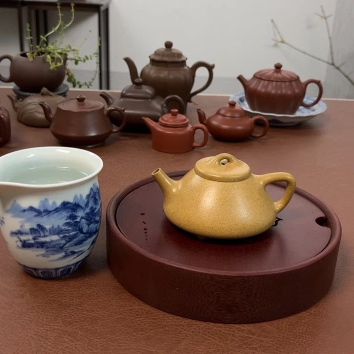 紫砂茶壶华****部子冶黄金段半手壶